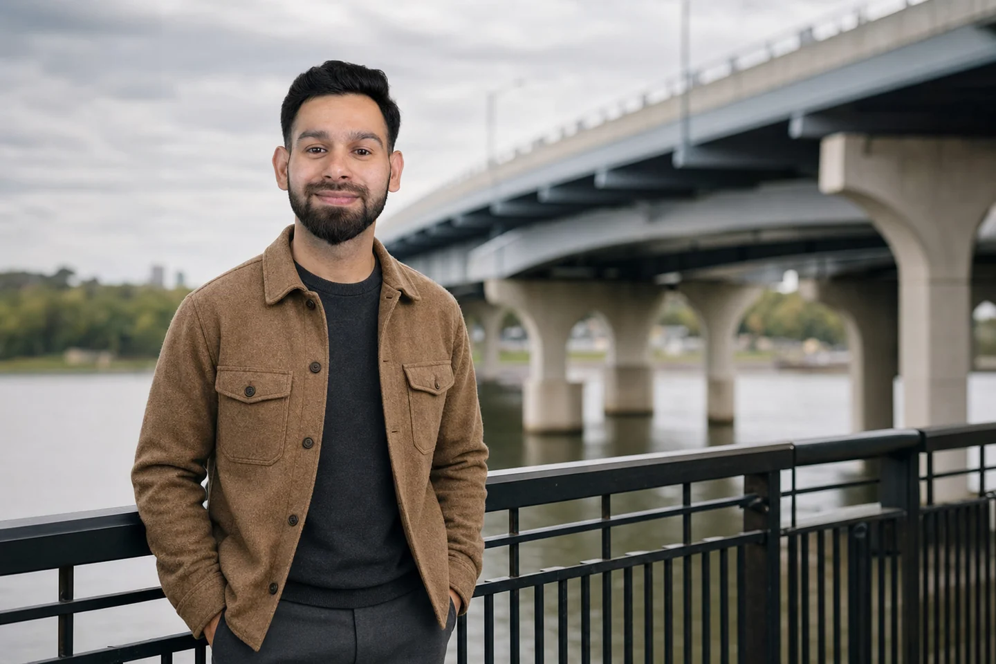 Nirav Khanal beside a bridge